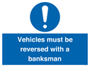 vehicles-must-be-reversed-with-a-banksman~